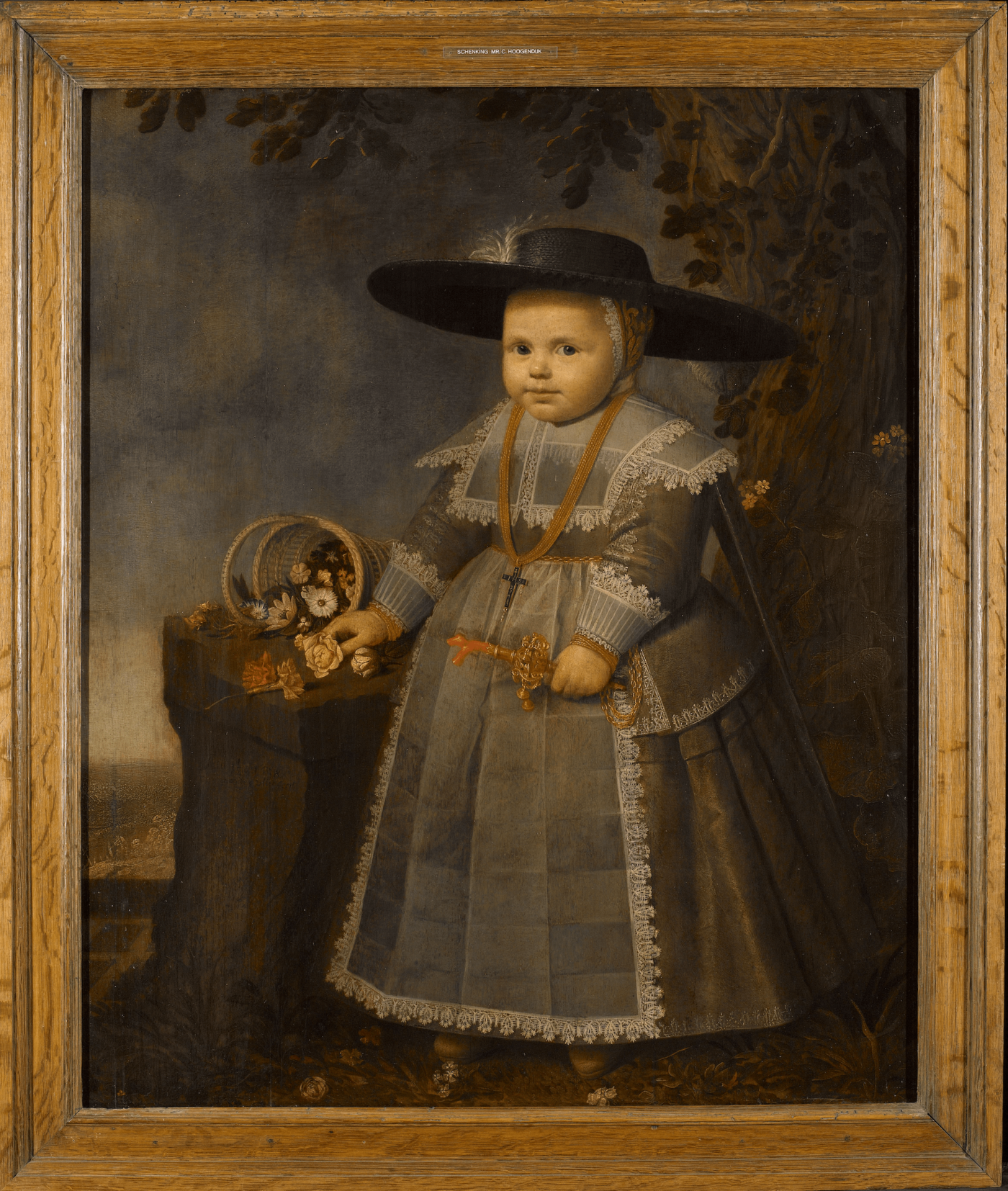 Schilderij van een kleine jongen met een gouden rammelaar RM Blog Zilver.nl