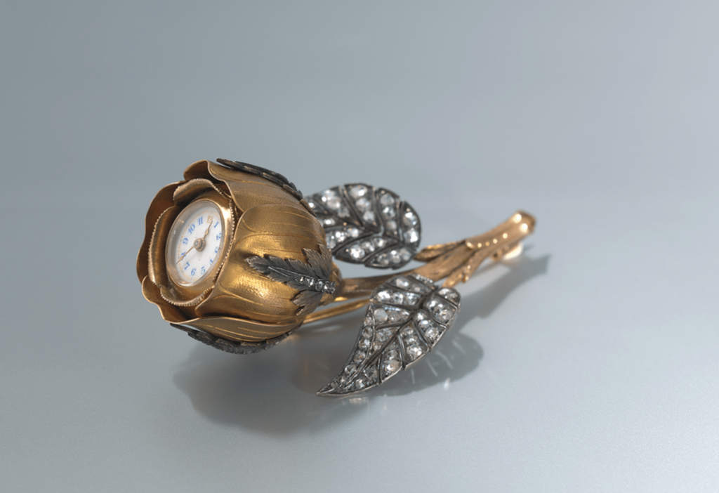 Gouden broche horloge diamant en emaille