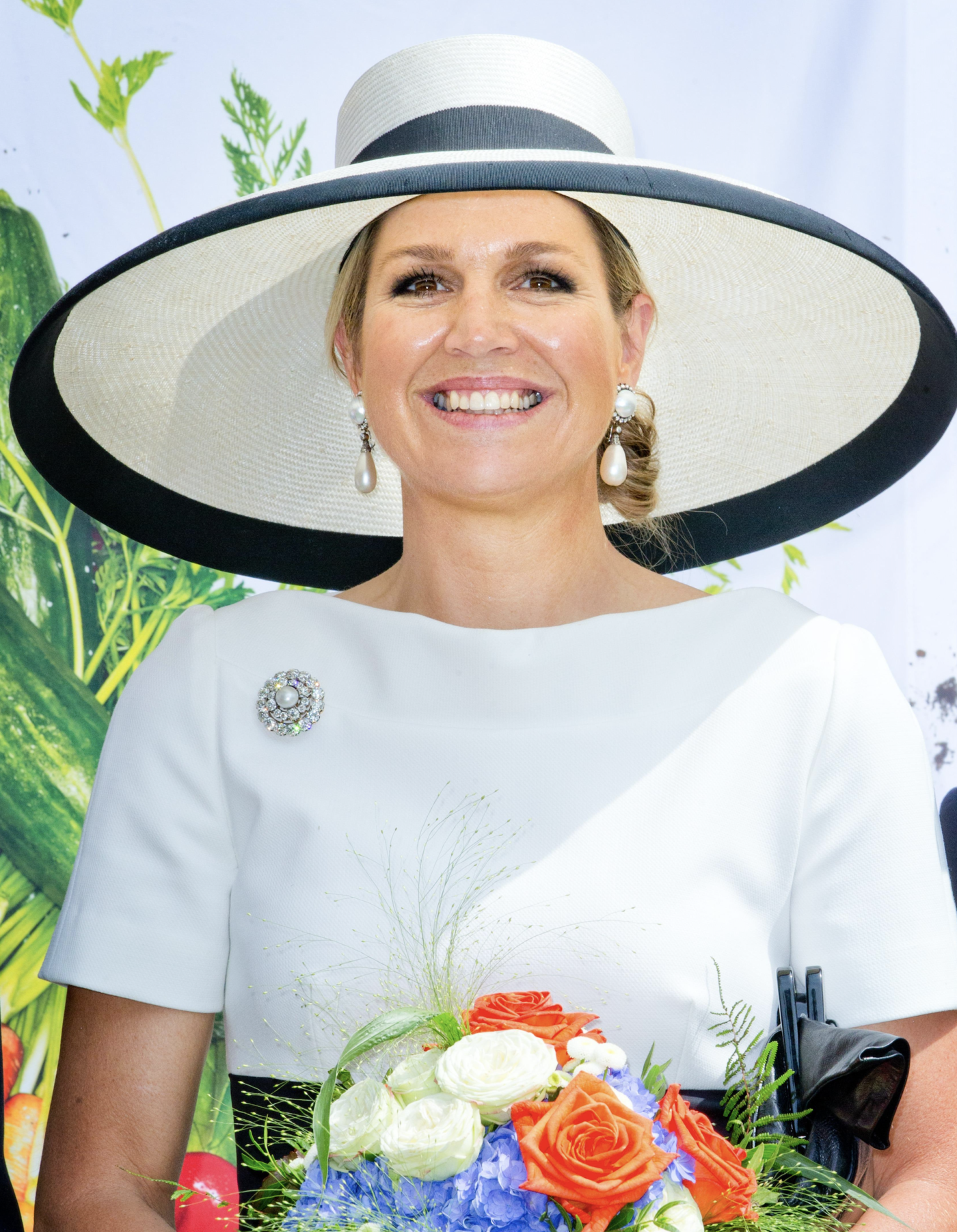 Koningin Maxima met broche met een bouton parel Blog Zilver.nl