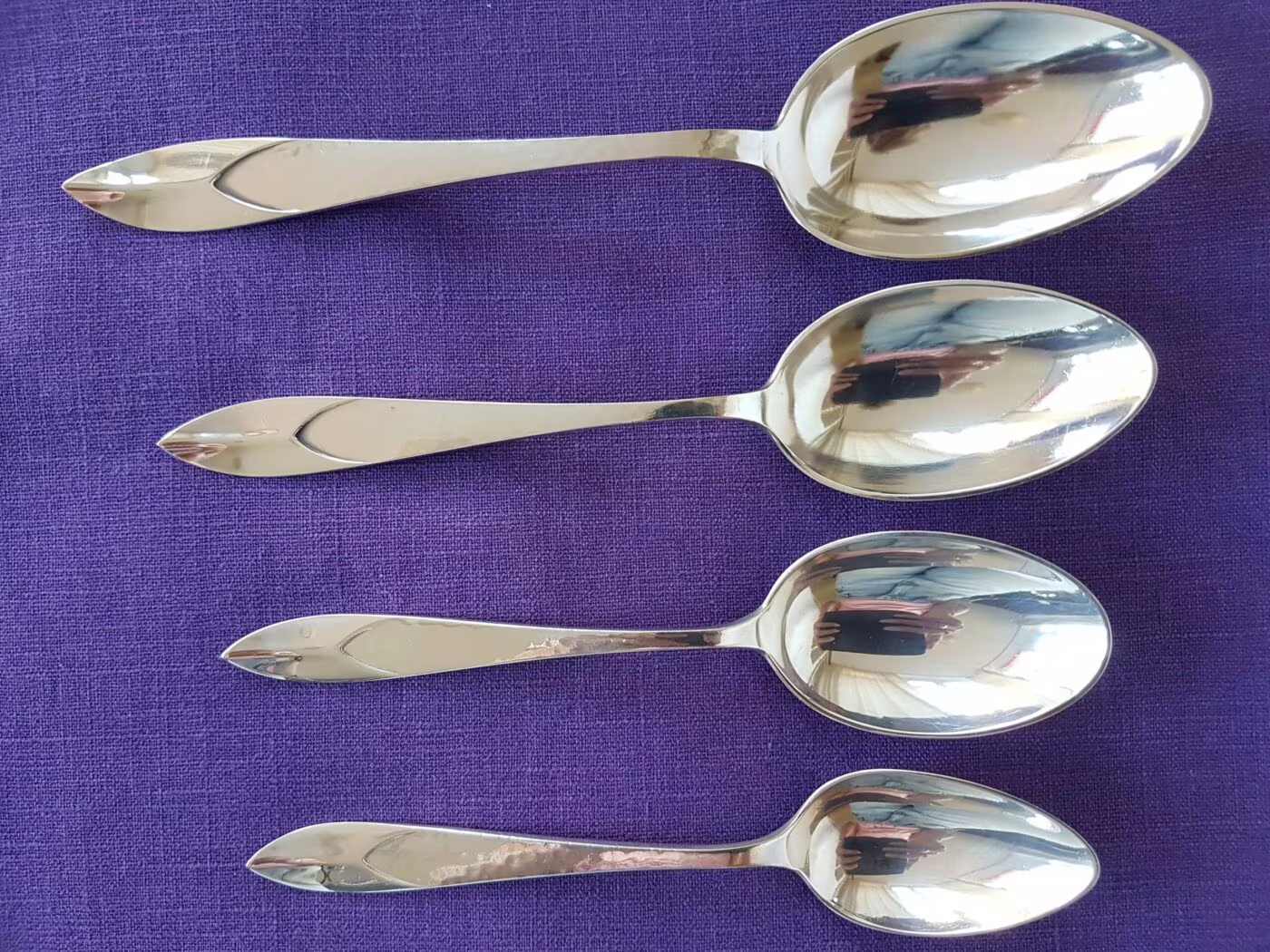 Zilveren couverts met een kinderlepel Art Deco - Zilver.nl